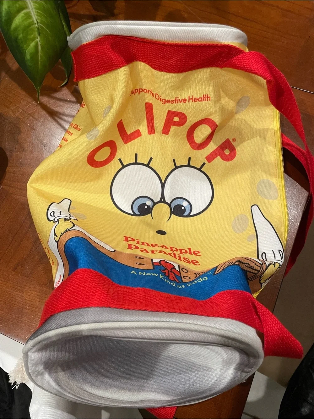 Olipop X SpongeBob Squarepants pineapple paradise cylinder duffle bag. 18”